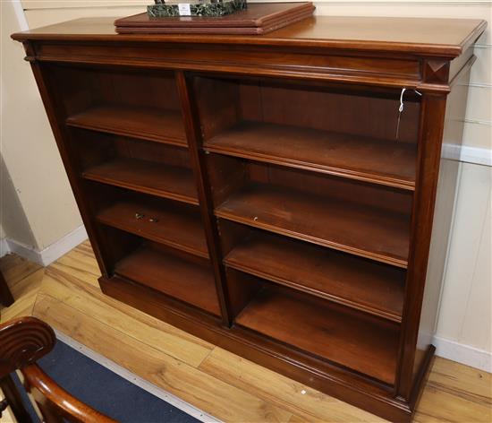 An Edwardian walnut open bookcase W.152cm